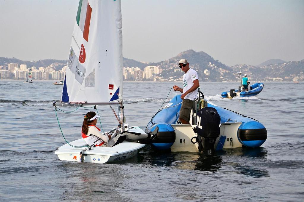 Annaleis Murphy (IRL) with her coach awaiting the start of the Laser Radial Medal Race © Richard Gladwell www.photosport.co.nz